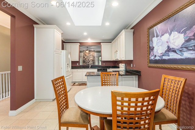 50021 Ludwig Ct, Shelby Twp, MI 48317 - dining area with crown molding, light tile patterned flooring, recessed lighting, and baseboards