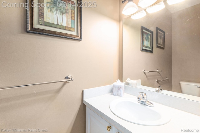 50021 Ludwig Ct, Shelby Twp, MI 48317 - half bathroom with vanity and toilet