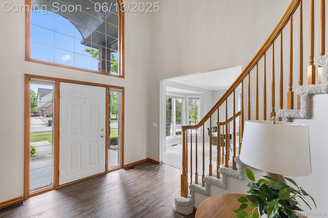49093 Poppleton Ct, Canton, MI 48187 - entrance foyer with wood finished floors, stairs, and a towering ceiling