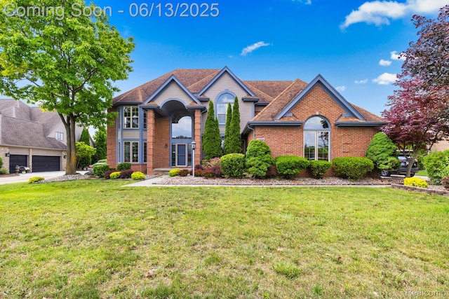 49093 Poppleton Ct, Canton, MI 48187 - traditional-style house with brick siding and a front yard