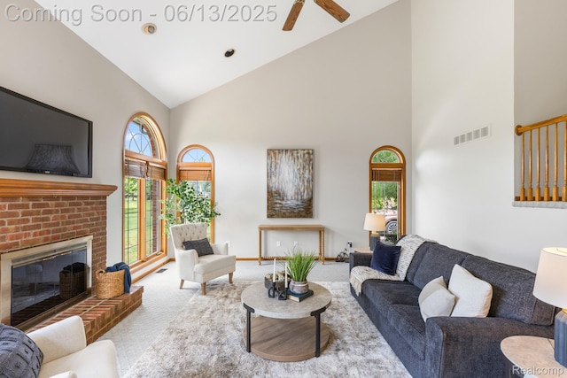 49093 Poppleton Ct, Canton, MI 48187 - carpeted living room featuring high vaulted ceiling, a fireplace, and ceiling fan