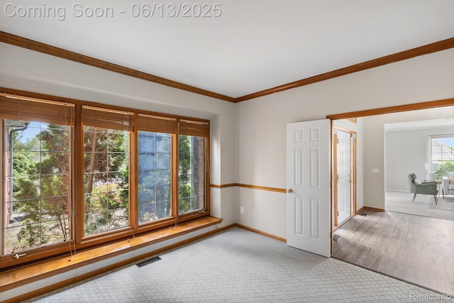 49093 Poppleton Ct, Canton, MI 48187 - carpeted empty room with baseboards and crown molding