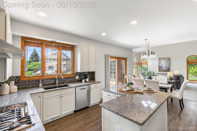 49093 Poppleton Ct, Canton, MI 48187 - kitchen featuring appliances with stainless steel finishes, dark wood-style flooring, decorative backsplash, white cabinets, and stone countertops