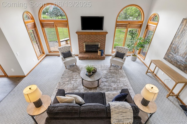 49093 Poppleton Ct, Canton, MI 48187 - carpeted living area featuring a towering ceiling and a fireplace