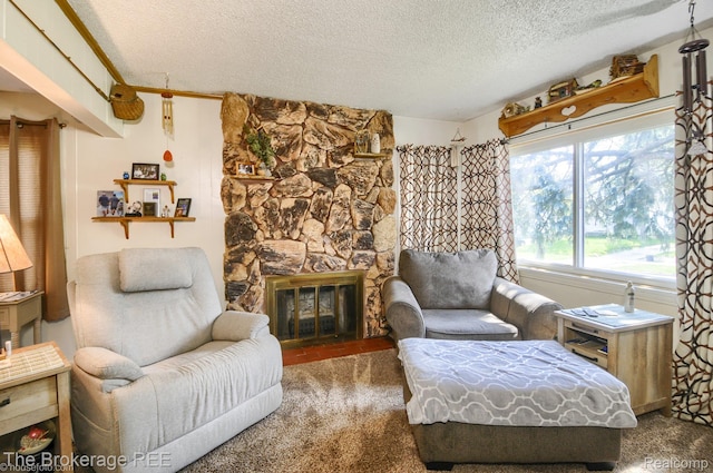 1329 Knight Ave, Flint, MI 48503 - living area featuring a textured ceiling, a fireplace, and carpet floors