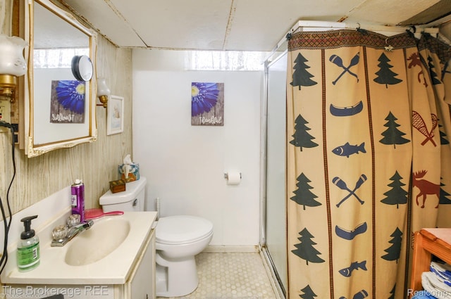 1329 Knight Ave, Flint, MI 48503 - full bathroom with vanity, toilet, a shower with shower curtain, tile patterned floors, and baseboards