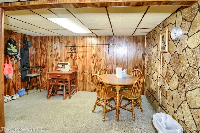 1329 Knight Ave, Flint, MI 48503 - carpeted dining space featuring a drop ceiling and wooden walls