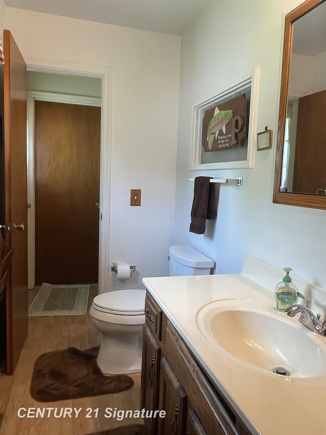 1045 N Pinecrest Ln, Grand Blanc, MI 48439 - bathroom featuring toilet and vanity