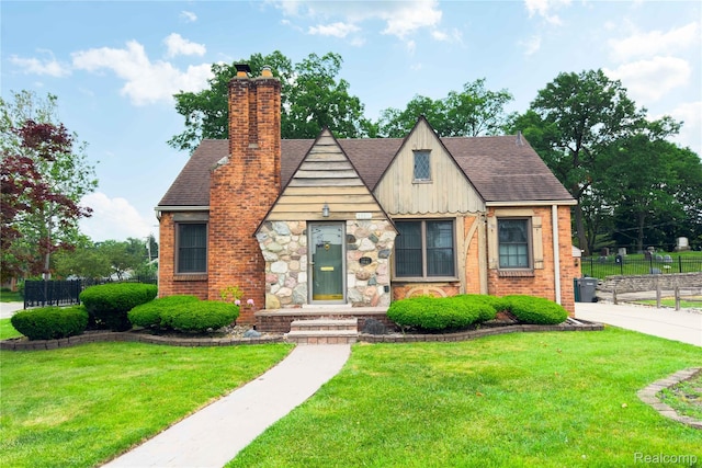 23211 Myrtle St, Dearborn, MI 48128 - view of front of home featuring roof with shingles and a chimney