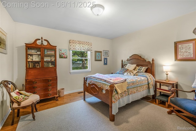8351 Duffield Rd, Gaines, MI 48436 - bedroom with wood finished floors and baseboards