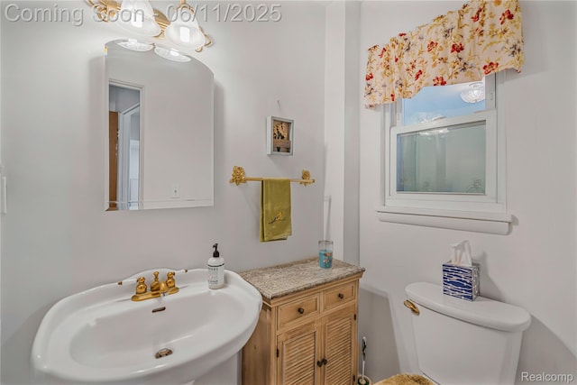 8351 Duffield Rd, Gaines, MI 48436 - half bath with a sink and toilet