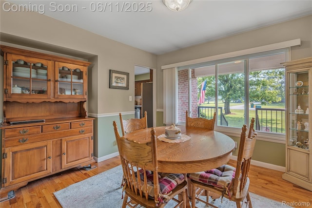 8351 Duffield Rd, Gaines, MI 48436 - dining room featuring baseboards and light wood-style floors