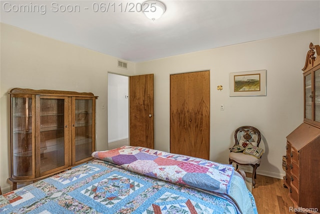 8351 Duffield Rd, Gaines, MI 48436 - bedroom featuring wood finished floors and baseboards