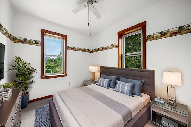 1820 E Rocky Weed Rd, Berrien Springs, MI 49103 - bedroom with carpet flooring, baseboards, and a ceiling fan
