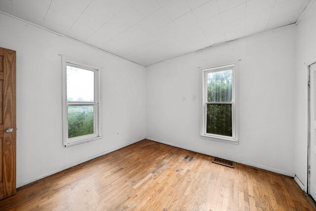 1820 E Rocky Weed Rd, Berrien Springs, MI 49103 - spare room featuring wood finished floors