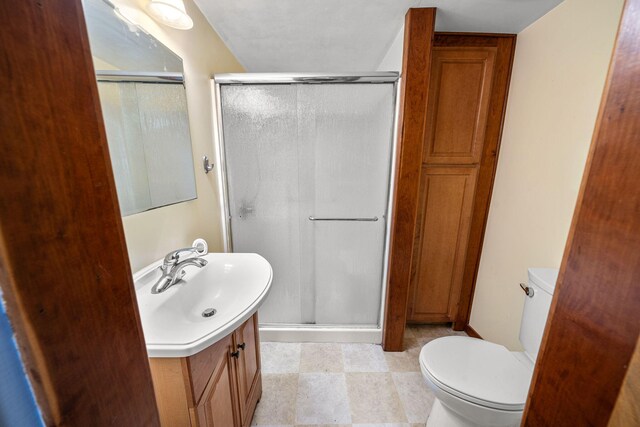 1820 E Rocky Weed Rd, Berrien Springs, MI 49103 - full bath with vanity, a shower stall, and toilet