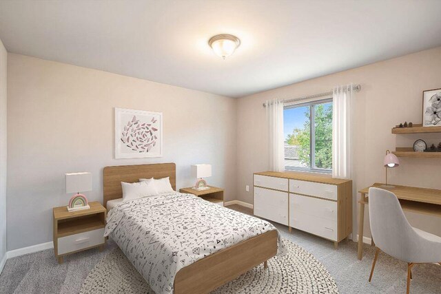 13678 Oasis Ave, Holland, MI 49424 - bedroom featuring baseboards and light carpet