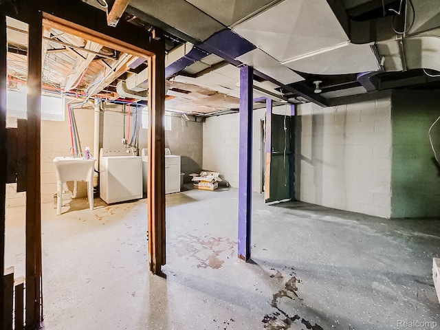15882 Appoline St, Detroit, MI 48227 - unfinished below grade area featuring separate washer and dryer and a sink
