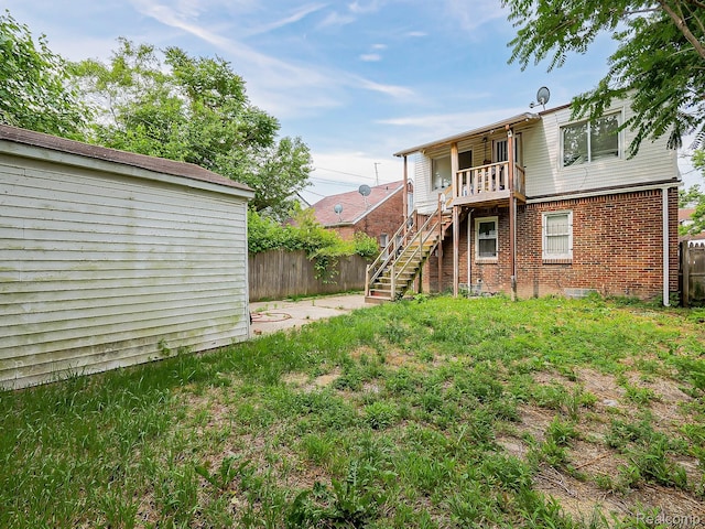 15882 Appoline St, Detroit, MI 48227 - back of property featuring stairway and brick siding
