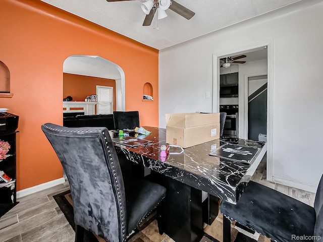 15882 Appoline St, Detroit, MI 48227 - office with ceiling fan, arched walkways, and wood finished floors