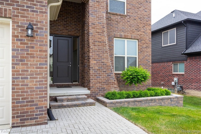 24738 Callaway Dr, Macomb, MI 48042 - entrance to property with brick siding and a garage