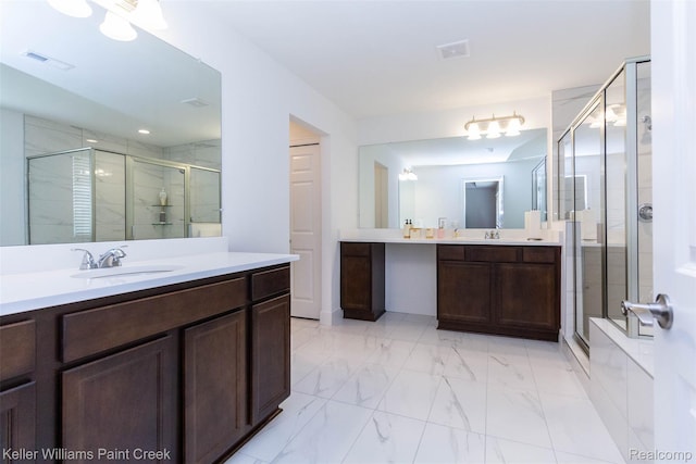 24738 Callaway Dr, Macomb, MI 48042 - bathroom with a shower stall, two vanities, and marble finish flooring