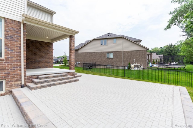 24738 Callaway Dr, Macomb, MI 48042 - covered porch with a trampoline