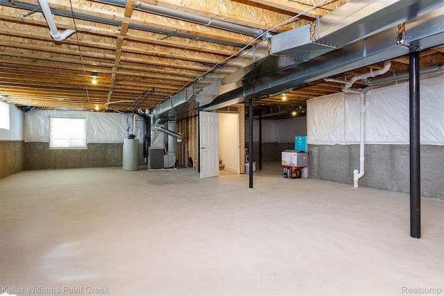24738 Callaway Dr, Macomb, MI 48042 - basement with water heater and heating unit