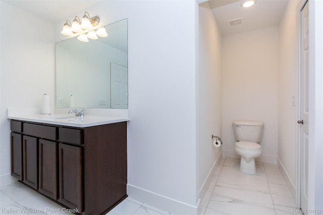 24738 Callaway Dr, Macomb, MI 48042 - bathroom featuring vanity and marble finish flooring