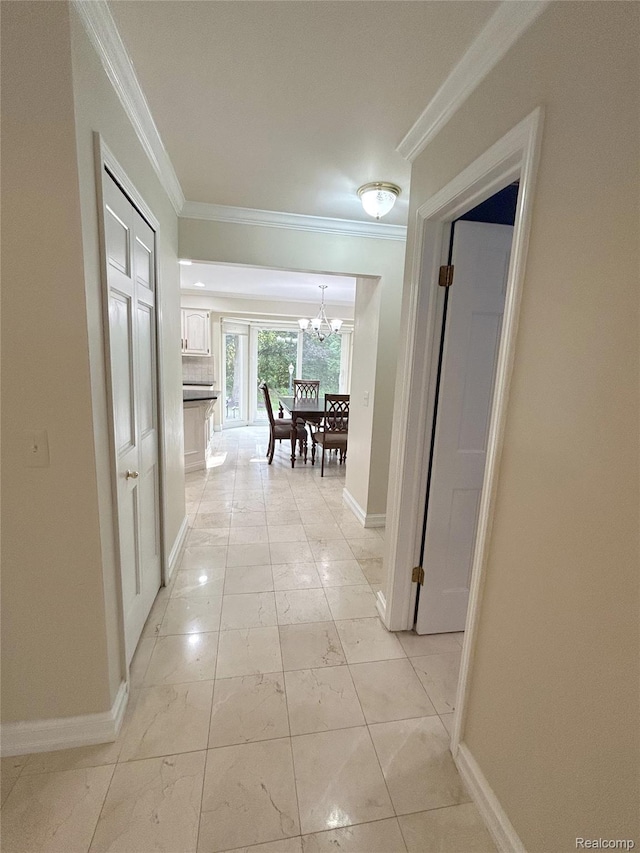 4567 Odette Ct, Troy, MI 48098 - hall featuring a chandelier, crown molding, and light marble finish floors