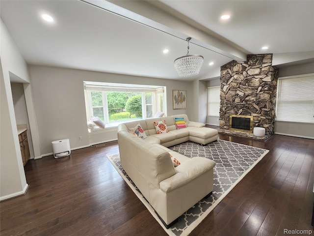 4567 Odette Ct, Troy, MI 48098 - living area with dark wood-style floors, a chandelier, a stone fireplace, and recessed lighting