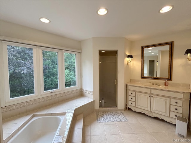 4567 Odette Ct, Troy, MI 48098 - full bath featuring vanity, a garden tub, recessed lighting, a shower stall, and tile patterned flooring