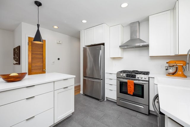 2534 Pamela Ave, Ann Arbor, MI 48103 - kitchen with stainless steel appliances, wall chimney range hood, recessed lighting, white cabinets, and light countertops