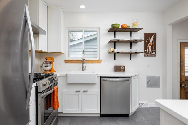 2534 Pamela Ave, Ann Arbor, MI 48103 - kitchen featuring stainless steel appliances, a sink, light countertops, and recessed lighting