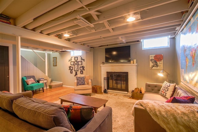 2534 Pamela Ave, Ann Arbor, MI 48103 - living area featuring stairs, a fireplace, and wood finished floors