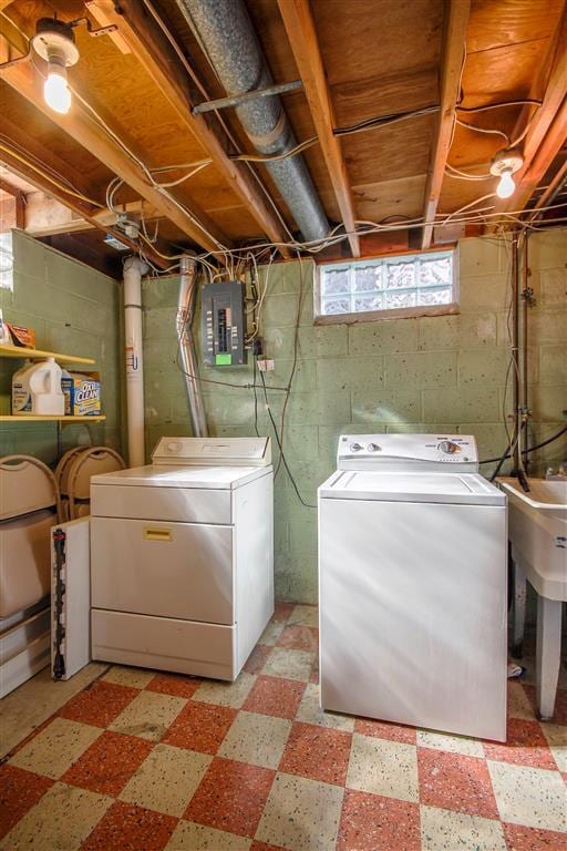 2534 Pamela Ave, Ann Arbor, MI 48103 - laundry room with washing machine and clothes dryer, light flooring, and electric panel