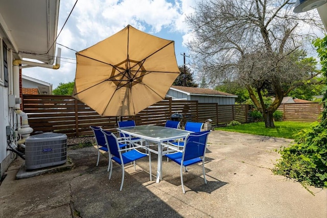 2534 Pamela Ave, Ann Arbor, MI 48103 - fenced backyard featuring central AC unit, a patio, and outdoor dining area
