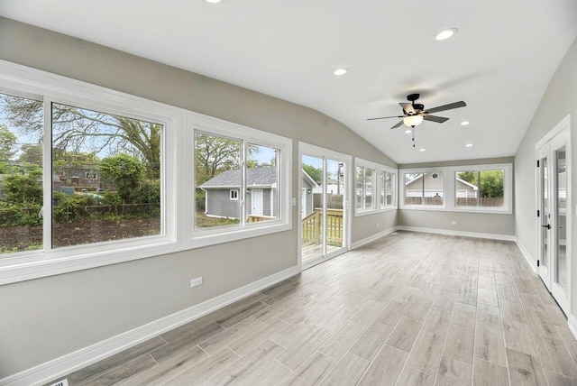 340 N Berrien St, New Buffalo, MI 49117 - unfurnished sunroom featuring healthy amount of natural light, baseboards, wood finished floors, lofted ceiling, and recessed lighting