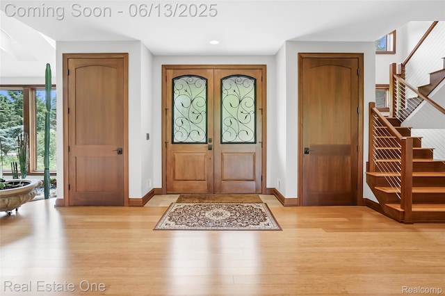 15349 Lakeside St, Plymouth, MI 48170 - entrance foyer with light wood-style floors, stairs, plenty of natural light, and recessed lighting