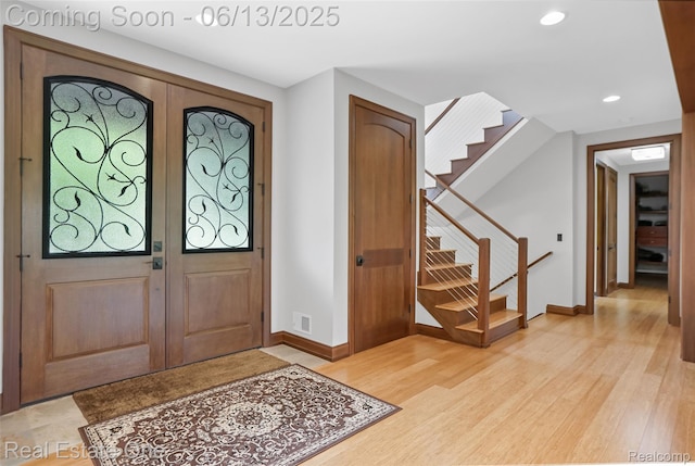 15349 Lakeside St, Plymouth, MI 48170 - foyer entrance with stairway, light wood-style floors, and recessed lighting