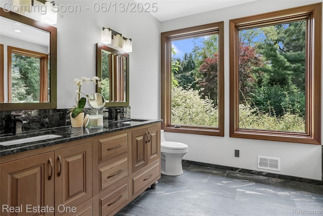 15349 Lakeside St, Plymouth, MI 48170 - full bathroom with double vanity and backsplash