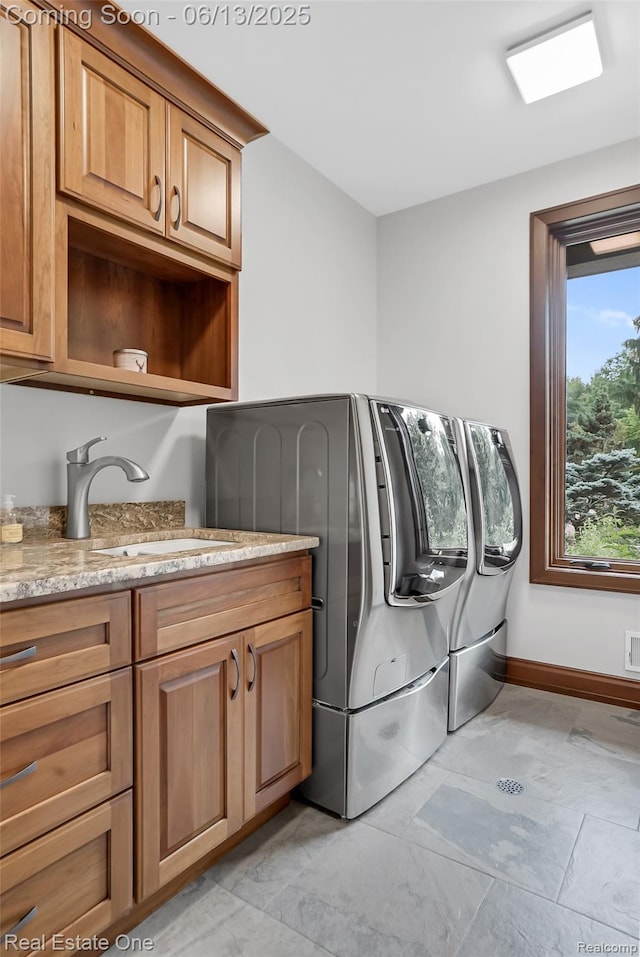 15349 Lakeside St, Plymouth, MI 48170 - laundry room featuring washing machine and dryer and cabinet space