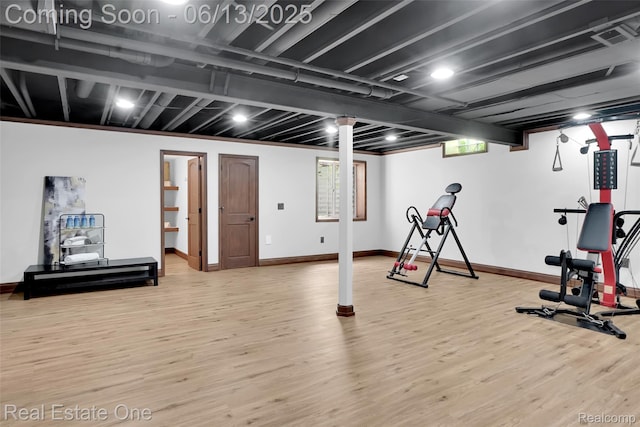 15349 Lakeside St, Plymouth, MI 48170 - workout room featuring wood finished floors and baseboards