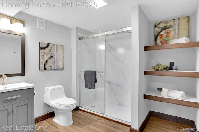 15349 Lakeside St, Plymouth, MI 48170 - bathroom featuring wood finished floors, vanity, and a marble finish shower