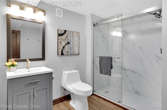 15349 Lakeside St, Plymouth, MI 48170 - bathroom with wood finished floors, vanity, and a marble finish shower