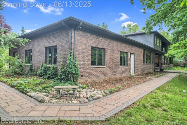 15349 Lakeside St, Plymouth, MI 48170 - view of home's exterior with brick siding