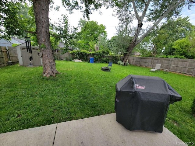 8100 Toepfer Rd, Warren, MI 48089 - fenced backyard with a storage unit