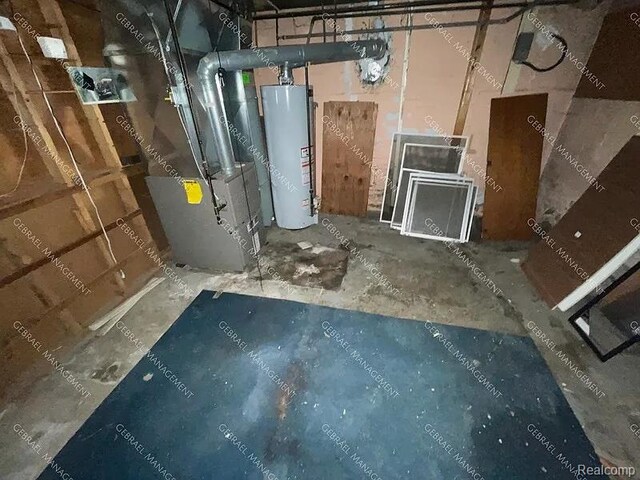 2307 Monteith St, Flint, MI 48504 - utility room featuring gas water heater