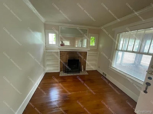 2307 Monteith St, Flint, MI 48504 - unfurnished living room with ornamental molding, a fireplace with flush hearth, baseboards, and wood finished floors
