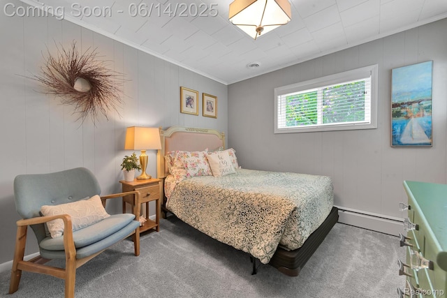 2968 Wolverine Rd, East Tawas, MI 48730 - bedroom featuring ornamental molding, a baseboard radiator, and carpet flooring